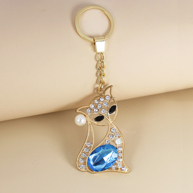 kitty long blue necklace