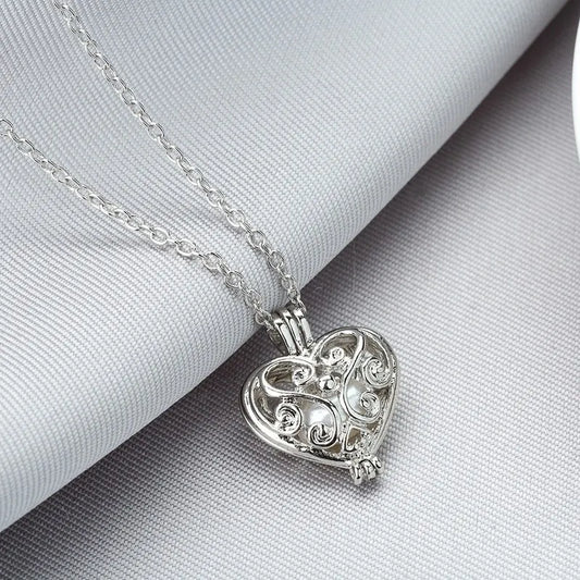 Hollow pearl cage necklace