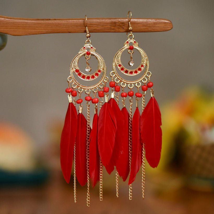 Feather time gold earrings 4754