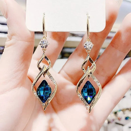 Blue with a twist gold earrings