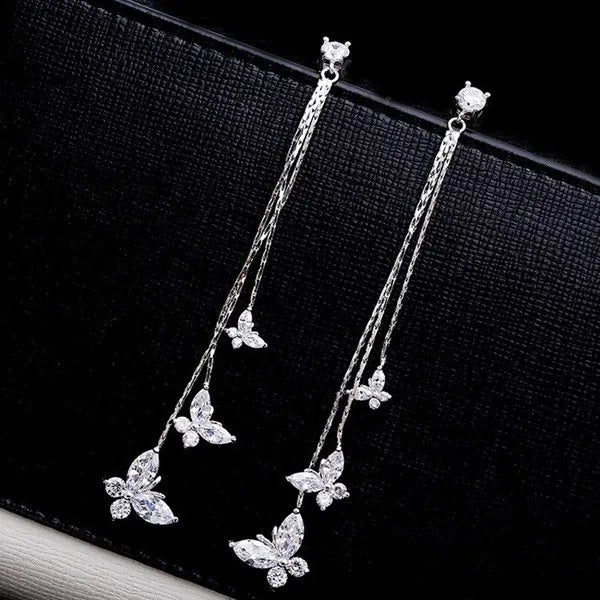 Tassel of flutter white earrings 6101