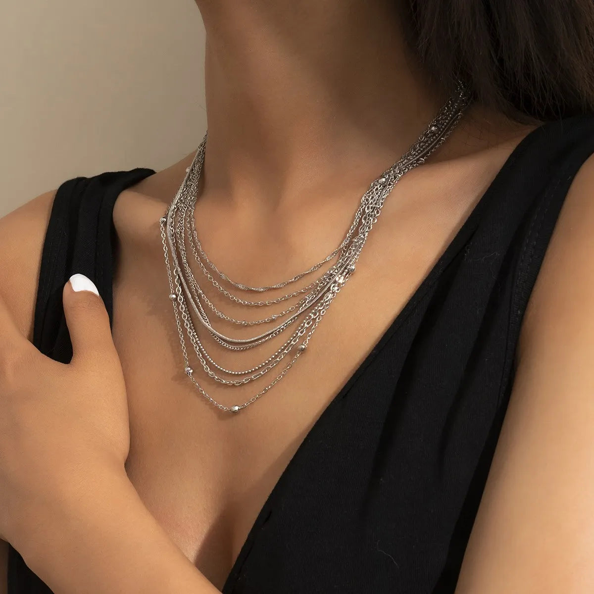 layered up silver necklace