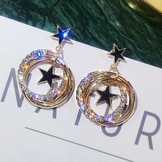 Circles and stars gold earrings 6885