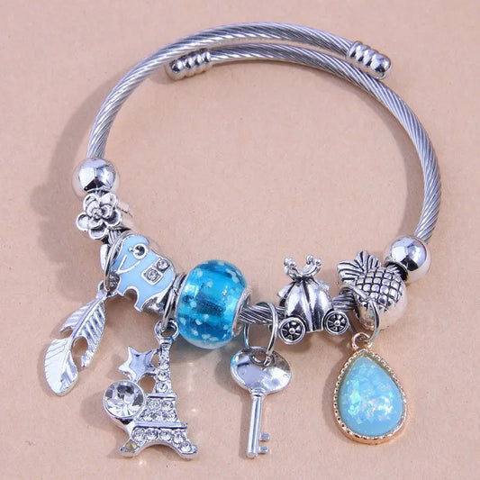 Coil blue charm bracelet 7663